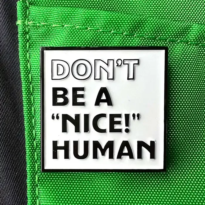 “Don‘t Be A ‘NICE!‘ Human” Pin – Double Metal Backer