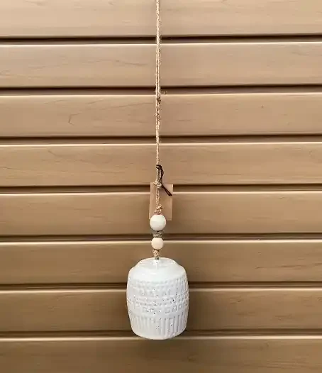 WHITE STONEWARE BELL WITH BEADS